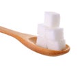 Cube sugars in wooden spoon Royalty Free Stock Photo