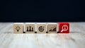 Cube wooden block stack with the key on business strategy icon with graph and arrow Bullseye of strategic plan and marketing organ Royalty Free Stock Photo