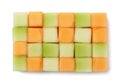 Cubed pieces of fruit arranged in a rectangular grid. The cubes alternate between Royalty Free Stock Photo