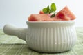 Cubed watermelon serving in a ceramic bowl