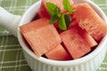 Cubed watermelon serving in a ceramic bowl