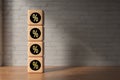 Cubes with black percent signs on wooden floor - 3D rendered illustration
