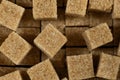Cubes of brown cane unrefined demerara sugar. Royalty Free Stock Photo