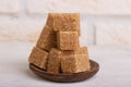 Cubes of cane sugar in a wooden spoon Royalty Free Stock Photo