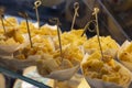 Cubes of cheese on the counter of the store in the market. Selective focus. Royalty Free Stock Photo