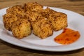 Cubes of cheese and tapioca. Brazilian snack called Dadinho de tapioca made with rennet cheese and tapioca flour, served with