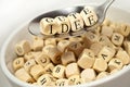 Cubes dice with with spoon alphabet soup with the german words for good idea - gute idee Royalty Free Stock Photo