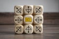 Cubes and dice with arrow and bow icon showing the word idea - idee, metaphor goal or target
