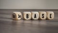 Cubes and dice with 1st base and 2nd base on wooden background Royalty Free Stock Photo