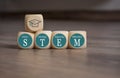 Cubes and dice with STEM Science, Technology, Engineering and Mathematics Royalty Free Stock Photo