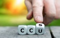 Cubes form the expression CCU and CCS