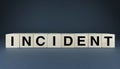 Cubes form the word Incident. Conceptual image for applying different kinds of incidents Royalty Free Stock Photo