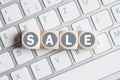 Cubes forming the word sale on a computer keyboard Royalty Free Stock Photo