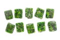 Cubes of frozen spinach on the white background Royalty Free Stock Photo