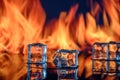 three ice cubes against the background of fire, fire and ice, place under the text Royalty Free Stock Photo