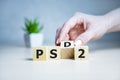 cubes with the message PSD2 - 2nd Payment Services Directive on wooden background