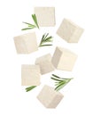 Cubes of raw tofu falling on white background Royalty Free Stock Photo