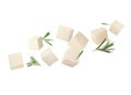 Cubes of raw tofu falling on white background Royalty Free Stock Photo