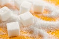 Cubes of refined sugar on a yellow table close-up Royalty Free Stock Photo