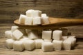 Cubes of Sugar in wooden spoon Royalty Free Stock Photo