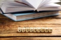 Cubes with word Blacklist and notebooks on wooden table, closeup Royalty Free Stock Photo