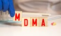 cubes with the word MDMA on them. Care concept Royalty Free Stock Photo