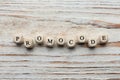 Cubes with words Promo Code on white wooden table, flat lay