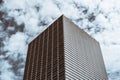 Cubic building in a cloudy sky