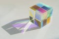 Cubic rainbow prism on a white background Royalty Free Stock Photo