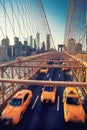 Cubs speeding at sunset on Brooklyn Bridge, Manhattan. One of the most iconic bridges in the world, New York City Royalty Free Stock Photo