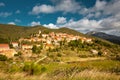 Cucugnan, typical small French village in the Corbieres mountains, at the foot of Cathar castle, Queribus Royalty Free Stock Photo