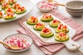 Cucumber appetizers with tuna and salmon spread with radish, fingerfood, healthy bits