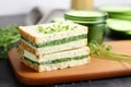 cucumber and cream cheese sandwich sprinkled with fresh chives