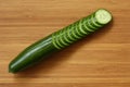 Cucumber on cutting board.