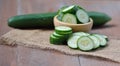 Cucumber isolated on wooden background