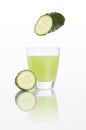 Cucumber juice in glass isolated on white Royalty Free Stock Photo