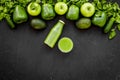 Cucumber, pepper, apple, celeriac. Vegetables for greeny organic smoothy for sport diet on dark background top view Royalty Free Stock Photo