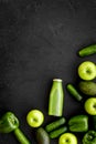 Cucumber, pepper, apple, celeriac. Vegetables for greeny organic smoothy for sport diet on dark background top view Royalty Free Stock Photo