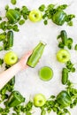Cucumber, pepper, apple, celeriac. Vegetables for greeny organic smoothy for sport diet on stone background top view Royalty Free Stock Photo