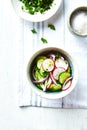 Cucumber and radish salad with red onion, sea salt and black pepper