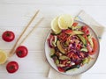 Cucumber salad healthy vegetable nutrition vegetarian , tomatoes, sticks fresh lemon on a white wooden background Royalty Free Stock Photo