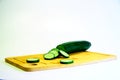 Cucumber sliced on a white background Cucumber cut into slices on a white background. Royalty Free Stock Photo