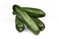 Cucumber and slices isolated over white background. Royalty Free Stock Photo