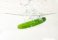 Cucumber in splash water on white background Royalty Free Stock Photo