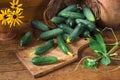 Cucumbers in  basket on  wooden table Royalty Free Stock Photo
