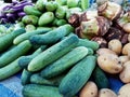 Cucumbers, potatoes, taro, raw mangoes, eggplants
