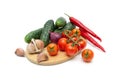 Cucumbers, tomatoes, chili peppers and garlic on white backgrou Royalty Free Stock Photo