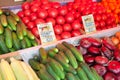 Cucumbers, tomatoes, onions at Vegetable Fair counter