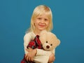 Cuddly toy. Small kid happy smiling. Happy childhood. My favorite childhood toy. Little girl with teddy bear. Small girl Royalty Free Stock Photo