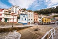 Cudillero, Spain - November 21, 2018: People in restaurants of famous fishers village of Cudillero, in Asturias, Spain